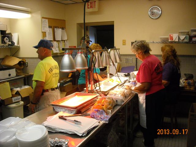 How things run smoothly when Denny Stahley is not in the Kitchen.   Sandwich Sale 2013